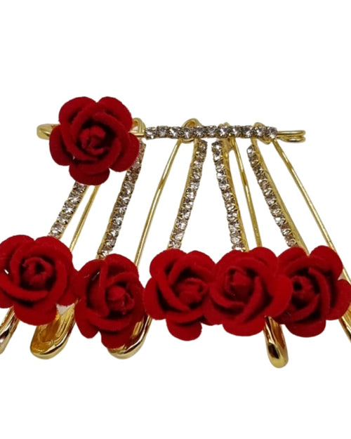 Saree Pin Designer, gold-toned safety pins adorned with six red roses and embedded clear stones