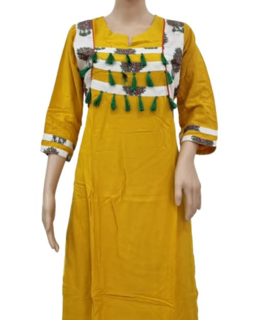 Soft Cotton Kurti, with three-quarter sleeves and hanging green tassels