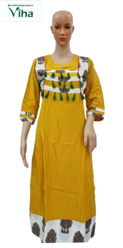 Soft Cotton Kurti, with three-quarter sleeves and hanging green tassels