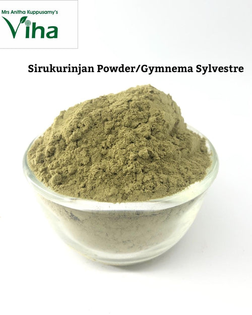 Sirukurinjan Powder / Cow Plant Powder, one clear bowl filled with brownish-green powdery substance under black text on white background