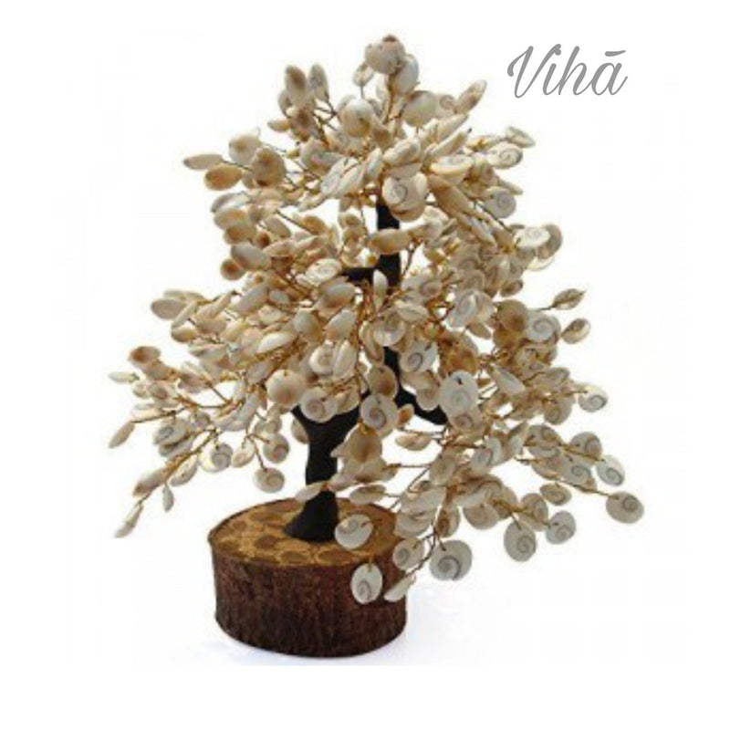 Gomati Chakra Tree, with small spiral shells acting as leaves and thin wire branches