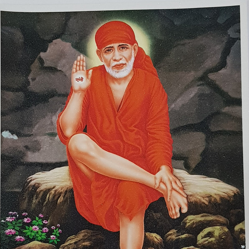 Shri Shidi Sai Baba Photo - Big, Sai Baba seated on a rock in an orange robe, one hand raised