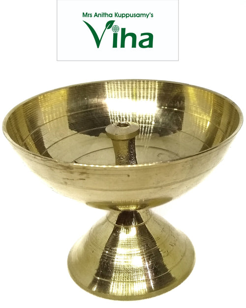 Brass athma vilakku, plain deep round oil bowl with a central wick pin on a conical pedestal
