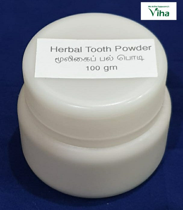 Herbal Tooth Powder, a small opaque white plastic round jar with a label on top, set against a dark blue background