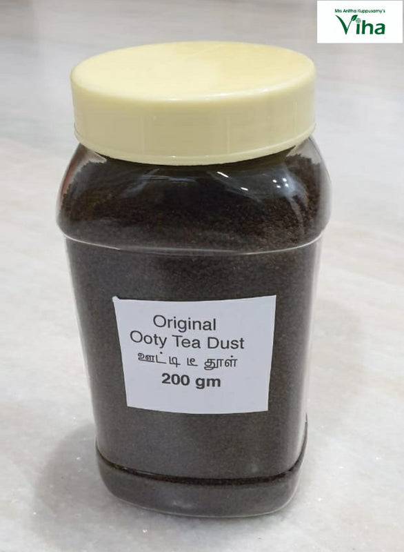 Ooty Premium Organic Black Tea in a translucent plastic jar with dark contents