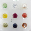 Navarathna Stones With Zircon Stone, nine round faceted stones in a three by three grid
