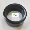 Karungali Wood Bangle, a wide black ring with a smooth finish resting on a speckled white surface