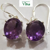 Amethyst Silver Hook Earrings with curved hooks and faceted stones