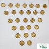 Set of 27 brass vilakku plates, small round lamp plates laid out in rows