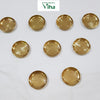 Set of 9 brass vilakku plates, small round lamp plates laid out in rows