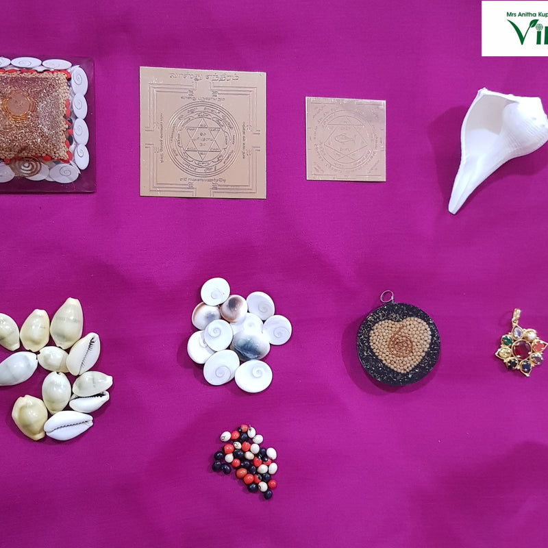 Main Entrance Vastu With Synthetic Navarathna Stones, a pink cloth holding a square pyramid, two square plates, a conch shell, twenty shells
