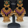 Jhumkas, drop earrings with hanging bells and floral elements