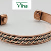 Copper Bracelet With Magnet, an open cuff of twisted rope-like wire