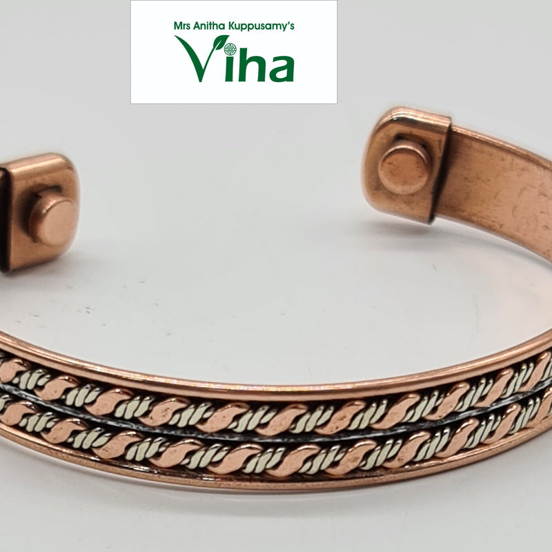 Copper Bracelet With Magnet, an open cuff of twisted rope-like wire