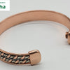 Copper Bracelet With Magnet, a copper-toned cuff bracelet with two interwoven rows of twisted copper-toned and silver-toned wire