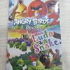 Angry Birds Snake & Ludo 1 Game, a vertical, glossy game packaging featuring cartoon illustrations of Angry Birds and green pigs in various poses and sizes