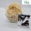 Wheat Noodles / No Maida, a clear glass bowl filled with beige noodles beside a small silver-toned packet