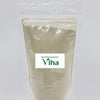 Amman Pacharisi Powder, a clear plastic pouch containing light-grey powder with one rectangular white label in the centre