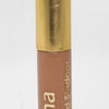Sandalwood Liquid Sindoor, a round container with a shiny gold-toned cap and a matte tan body featuring white printed text