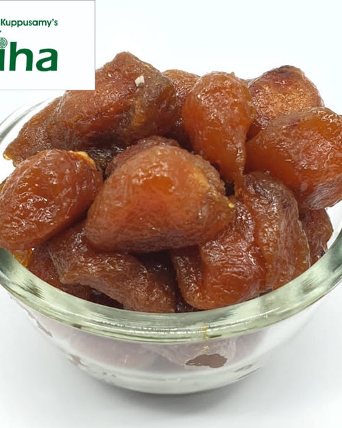 Alpakoda with a bowl of amber dried fruits