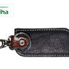 Viha Premium Keychain, textured black rectangular fob with white edge stitching, a brown riveted tab, and shiny silver-toned ring with clasp