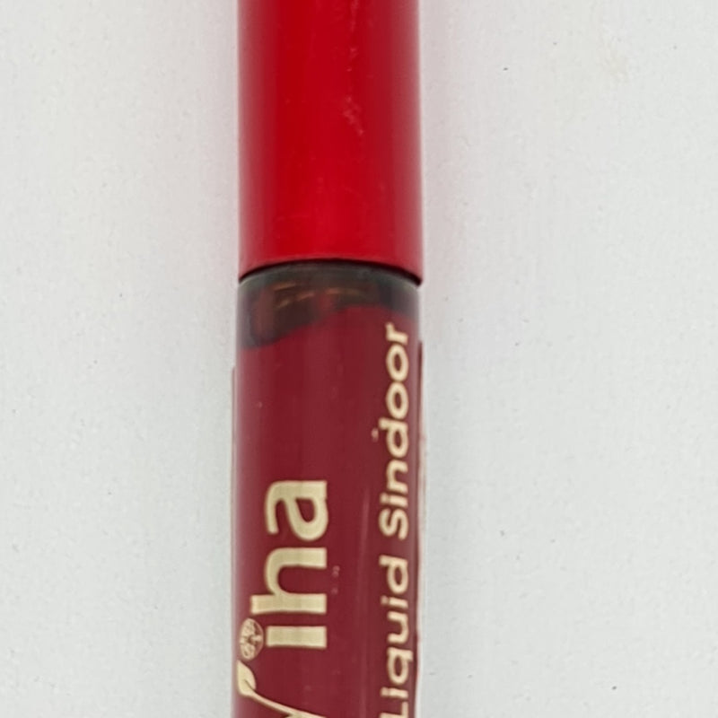 Maroon Liquid Sindoor, a red round tube with a glossy finish, featuring a darker red cap and white lettering on the side