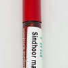 Maroon Liquid Sindoor, a vertical round red cosmetic bottle with a label containing black text