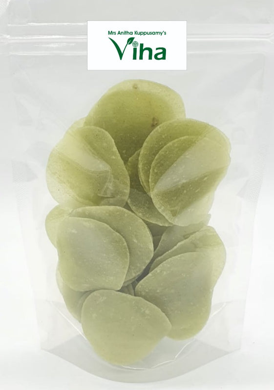 Green chilli fryums, in a tall transparent pouch