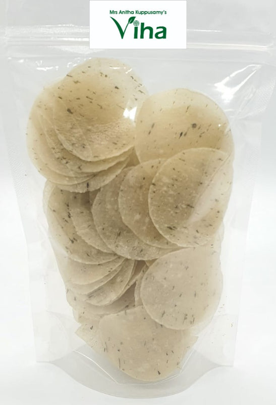 Kasuri methi fryums with round dried crisps in a plastic pouch
