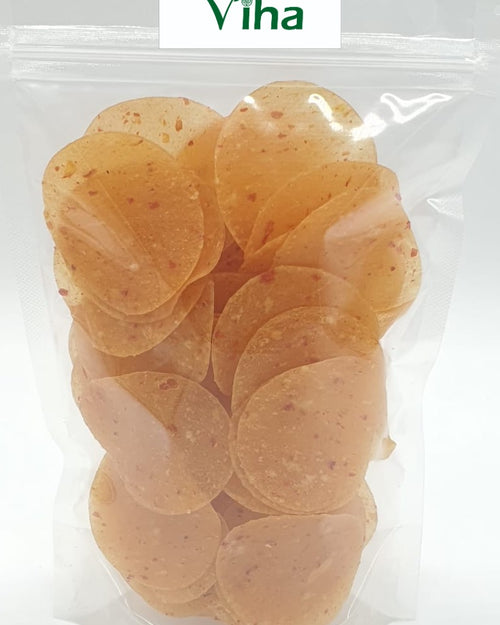 Tomato Chilli fryums, in a transparent plastic bag