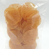 Tomato Chilli fryums, in a transparent plastic bag