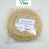 Vetiver Scrub / Vettiver, one round yellow-brown fibrous textured pad wrapped inside clear transparent plastic with a white rectangular text label attached