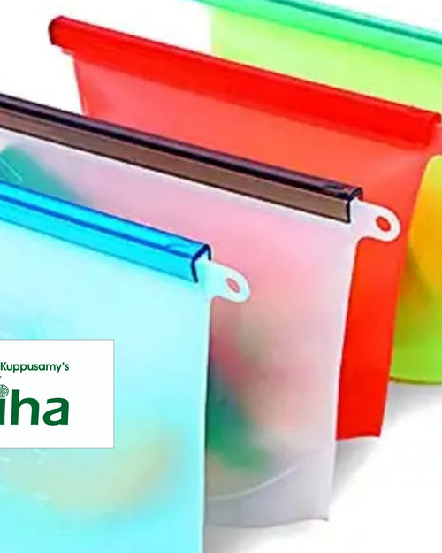 Silicone Bags, four flexible rectangular pouches in blue, white, red, and green with sliding top bars and corner holes