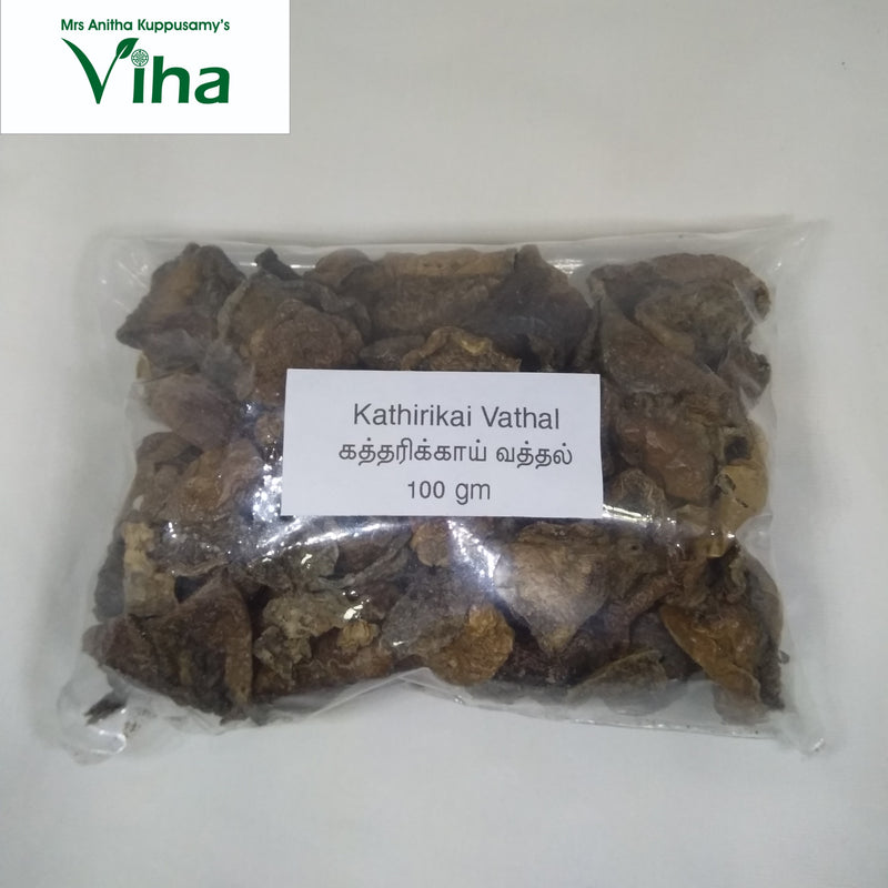 Brinjal Fryums with dark dried pieces in a transparent pouch