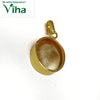 Gomathi Chakra Brass Pendant, a round gold-toned pendant with an enclosed glossy beige-and-white stone and a vertical suspension loop