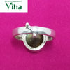 Silver Gomathi Chakra Ring, a silver-coloured metal ring featuring an adjustable band and a round bead-like element on a pink surface