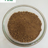 Soapnut Powder / Boondhi Kottai Powder, brown powder in a clear glass bowl against a white background