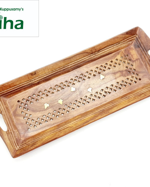 Wooden Tray, a rectangular brown wooden tray features curved handles and an inlaid pattern of pierced lattices and six light-colored leaf shapes