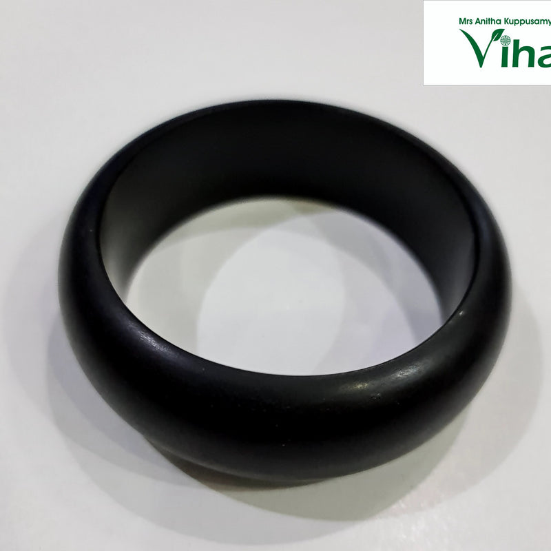 Karungali Wood Bangle, a single black bangle featuring a smooth, rounded surface with a matte finish