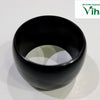 Karungali Wood Bangle, one thick black ring with a smooth finish resting on a white surface