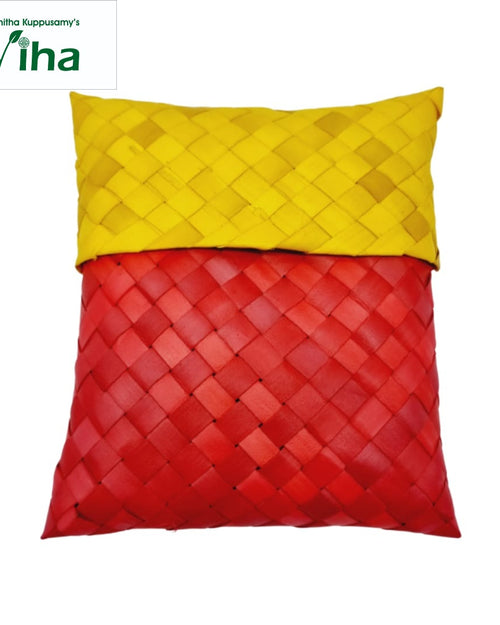Palm Leaf Pouch - Code - P, a rectangular woven object with a yellow upper half and red lower half, featuring an overlapping flap structure