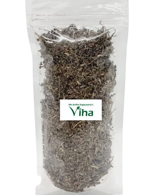 Tulsi Leaves, a vertical transparent plastic pouch filled with dried brown leaves and stems features a central white rectangular label with green text
