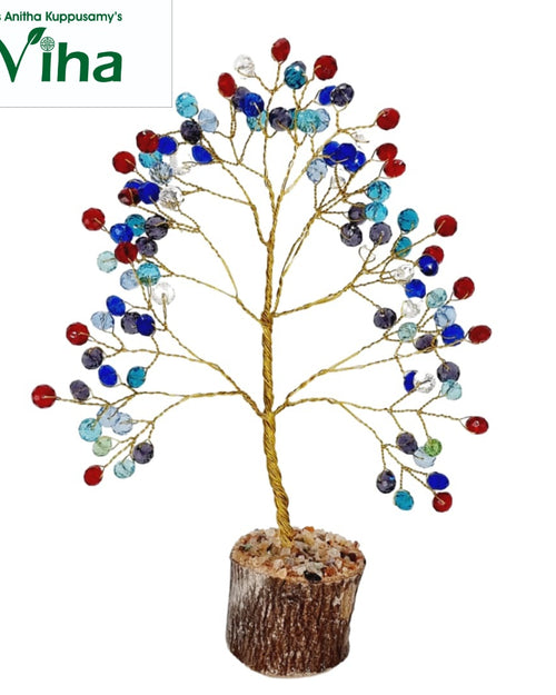 Multi Colour Vastu Crystal Lucky Tree, a decorative tree with a gold-toned wire frame and multicolored beads on its branches, seated in a textured round base