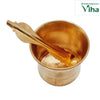 Panchapatram Copper, a gold-toned metallic cup with two engraved lines around its lower body and a leaf-shaped spoon resting inside