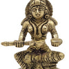 Annapoorani in brass, seated figure holding a long ladle in one hand and a bowl in the other