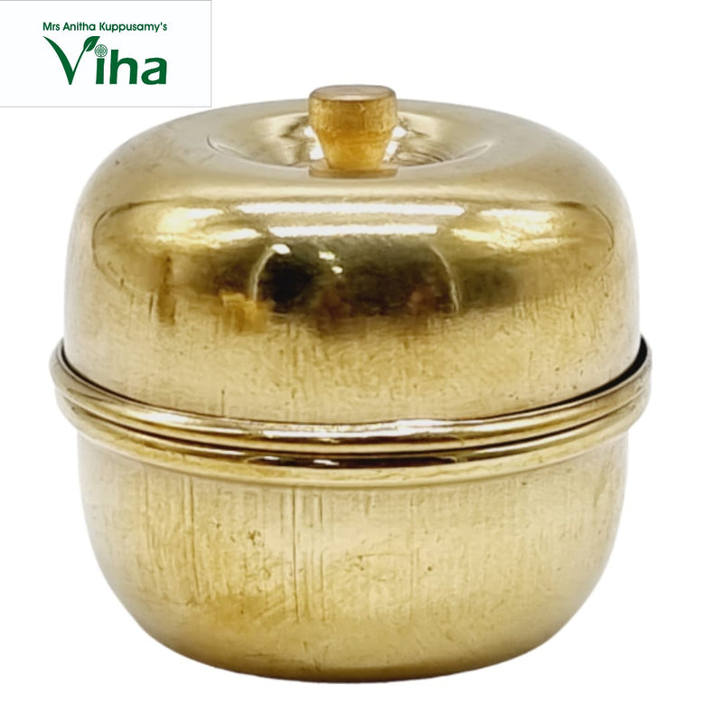 Apple Kumkuma Chimizh, an apple-shaped brass container with a lid and knob