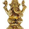 Ganesha in brass, four-armed elephant-headed figure seated on a tiered round pedestal with a curled trunk