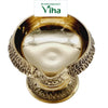 Stand Agal Lamp Brass, a glossy gold-toned metal bowl features a textured rim, a spout, and a pedestal base with detailed relief patterns