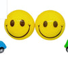 Smiley ball with Racing Car, two glossy yellow spheres with black smiling faces alongside two small toy cars, one blue and one green
