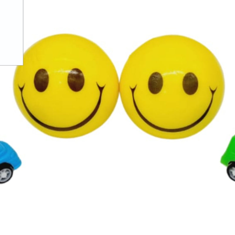 Smiley ball with Racing Car, two glossy yellow spheres with black smiling faces alongside two small toy cars, one blue and one green